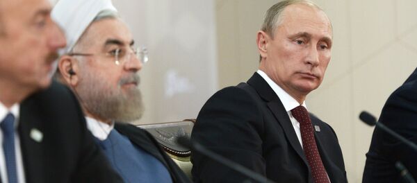 From left: President of Azerbaijan Ilham Aliyev, Iranian President Hassan Rouhani and Russian President Vladimir Putin (File) - Sputnik International