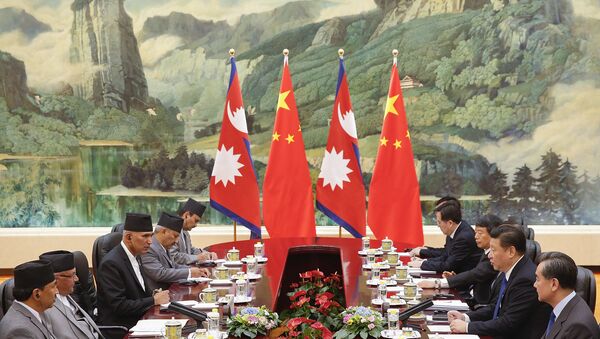 Chinese President Xi Jinping (2nd R) attends a meeting with Nepalese Prime Minister K.P. Sharma Oli (2nd L) at the Great Hall of the People in Beijing on March 21, 2016 - Sputnik International