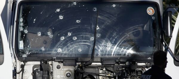 Bullet imacts are seen on the heavy truck the day after it ran into a crowd at high speed killing scores celebrating the Bastille Day July 14 national holiday on the Promenade des Anglais in Nice, France, July 15, 2016. Bullet imacts are seen on the heavy truck the day after it ran into a crowd at high speed killing scores celebrating the Bastille Day July 14 national holiday on the Promenade des Anglais in Nice, France, July 15, 2016. - Sputnik International