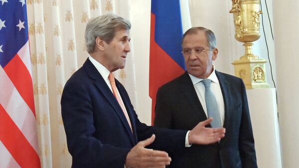 Russian Foreign Minister Sergei Lavrov, right, and US Secretary of State John Kerry at a meeting in Moscow. - Sputnik International
