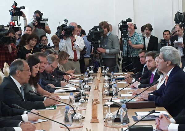 Russian Foreign Minister Sergei Lavrov, left, and US Secretary of State John Kerry, right, at a meeting in Moscow. Russian Foreign Minister Sergei Lavrov, left, and US Secretary of State John Kerry, right, at a meeting in Moscow. - Sputnik International