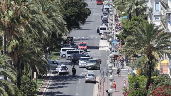A photo taken on July 15, 2016 shows a police barricade set up at the site in Nice where a gunman smashed a truck into a crowd of revellers celebrating Bastille Day, killing at least 84 people. - Sputnik International