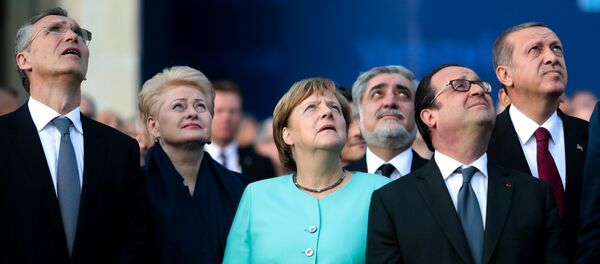 From left, NATO Secretary General, Lithuanian President Dalia Grybauskaite, German Chancellor Angela Merkel, French President Francois Hollande and Turkey’s President Recep Tayyip Erdogan watch a fly-past by NATO air forces planes during the NATO summit in Warsaw, Poland, Friday, July 8, 2016. From left, NATO Secretary General, Lithuanian President Dalia Grybauskaite, German Chancellor Angela Merkel, French President Francois Hollande and Turkey’s President Recep Tayyip Erdogan watch a fly-past by NATO air forces planes during the NATO summit in Warsaw, Poland, Friday, July 8, 2016. - Sputnik International