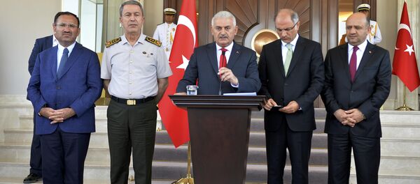 Turkey's Prime Minister Binali Yildirim speaks during a news conference, following an overnight attempted Turkish military coup, in Ankara, Turkey July 16, 2016. Turkey's Prime Minister Binali Yildirim speaks during a news conference, following an overnight attempted Turkish military coup, in Ankara, Turkey July 16, 2016. - Sputnik International