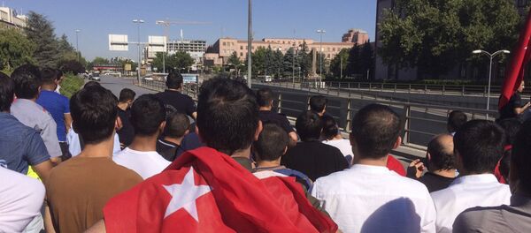 People with the Turkish national flags gather outside the military headquarters in Ankara, Turkey, Saturday July 16, 2016. - Sputnik International