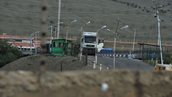 A truck waits at a check point on the Iranian side of the border near the Armenian town of Meghri, where the borders of Armenia, Azerbaijan, Iran and Turkey join - Sputnik International