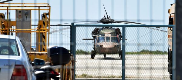 A Turkish military helicopter lands in the northern Greek city of Alexandroupolis with eight men on board who have requested political asylum after the attempted coup in Turkey, July 16, 2016. - Sputnik International