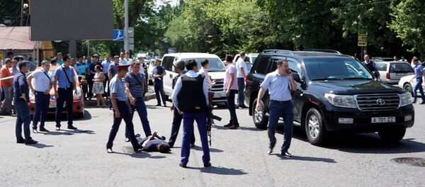 Police officers detain a man after an attack in the centre of Almaty, Kazakhstan, July 18, 2016 Police officers detain a man after an attack in the centre of Almaty, Kazakhstan, July 18, 2016 - Sputnik International