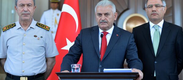 Chief of Staff General Hulusi Akar, Turkey's Prime Minister Binali Yildirim and Interior Minister Efkan Ala (LtoR) address a news conference, following an overnight attempted Turkish military coup, in Ankara, Turkey July 16, 2016 - Sputnik International