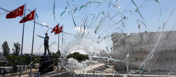 A damaged window is pictured at the police headquarters in Ankara, Turkey, July 18, 2016 - Sputnik International