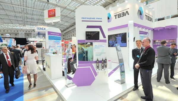 Participants of the 4th International Forum ATOMEXPO at the stand of Fuel Company TVEL set up at the specialized exhibition of nuclear industry and related sectors organizations - Sputnik International