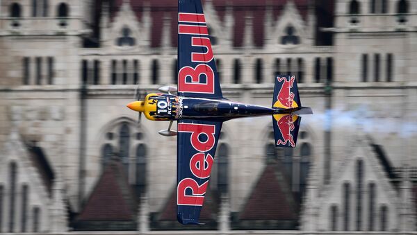 US Kirby Chambliss of the Team Chambliss with his Edge 540 V3 plane competes during the Red Bull Air Race World Championship over the river Danube in Budapest on July 17, 2016 - Sputnik International