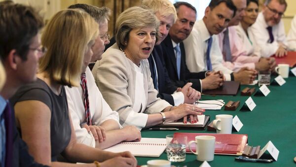 Britain's Prime Minister Theresa May (C) holds her first Cabinet Meeting at Downing Street, in London July 19, 2016. - Sputnik International