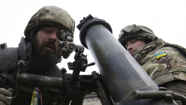 Ukrainian servicemen aim a mortar from their position near the eastern Ukrainian village Pisky, Donetsk region. File photo - Sputnik International