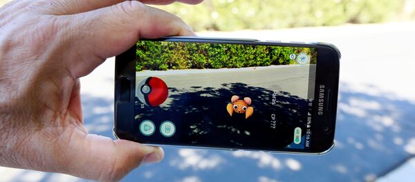 The augmented reality mobile game Pokemon Go by Nintendo is shown on a smartphone screen in this photo illustration taken in Palm Springs, California U.S. July 11, 2016 - Sputnik International