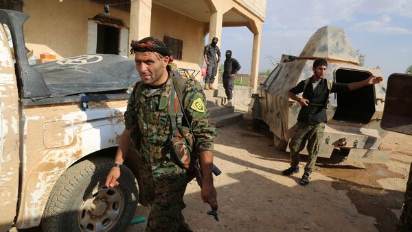 Kurdish and Arab fighters advance into the Islamic State (IS) jihadist's group bastion of Manbij, in northern Syria (File) - Sputnik International