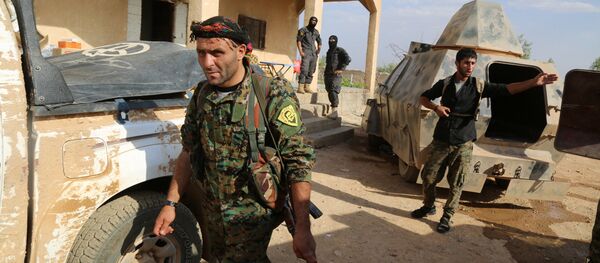 Kurdish and Arab fighters advance into the Islamic State (IS) jihadist's group bastion of Manbij, in northern Syria (File) - Sputnik International