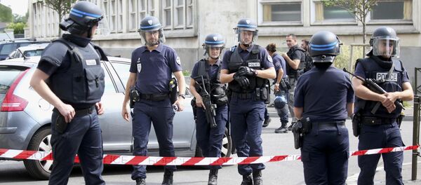 French police secure a street as members of special forces carried out counter-terrorism swoop at different locations in Argenteuil, a suburb in northern Paris, France, July 21, 2016 French police secure a street as members of special forces carried out counter-terrorism swoop at different locations in Argenteuil, a suburb in northern Paris, France, July 21, 2016 - Sputnik International