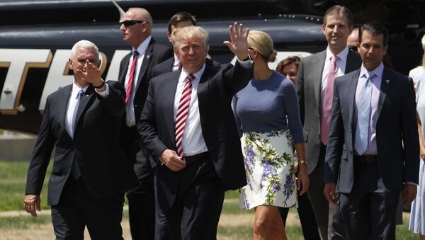 Republican U.S. presidential nominee Donald Trump (C) walks with vice presidential candidate Mike Pence (L) and family members after arriving for an event on the sidelines of the Republican National Convention in Cleveland, Ohio, U.S., July 20, 2016 - Sputnik International