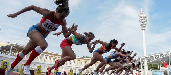 Athletes at the start of the women's 100m semifinal race at the Russian Track and Field Cup at the Meteor stadium in Zhukovsky, Moscow Region Athletes at the start of the women's 100m semifinal race at the Russian Track and Field Cup at the Meteor stadium in Zhukovsky, Moscow Region - Sputnik International