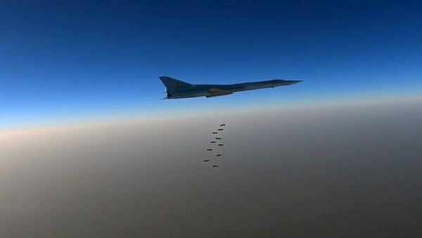 A Russian Air Force long-range bomber TU-22M3 seen here bombing ISIS targets near the towns of es-Sohne, Arak and al-Taiba in the Syrian province of Homs - Sputnik International