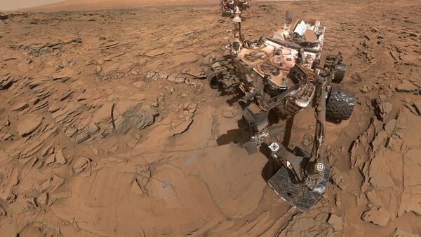Self-portrait of NASA's Curiosity Mars rover shows the vehicle at a drilled sample site called Okoruso, on the Naukluft Plateau of lower Mount Sharp. - Sputnik International