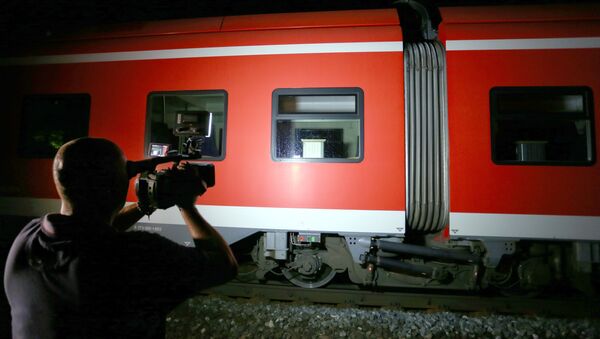 Cameraman films trains on which a man attacked passengers in Germany - Sputnik International