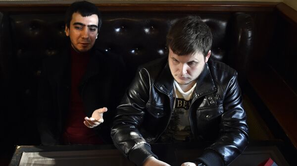 Russian pranksters (L-R) Vladimir Vovan Kuznetsov, 30, and Alexei Lexus Stolyarov, 28, speak during an interview with AFP at a bar in Moscow, on March 14, 2016 - Sputnik International