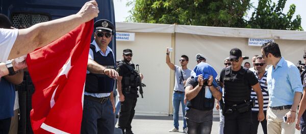 A Turkish military officer is transferred to a court hall in the city of Alexandroupolis, northern Greece, Thursday, July 21, 2016 A Turkish military officer is transferred to a court hall in the city of Alexandroupolis, northern Greece, Thursday, July 21, 2016 - Sputnik International
