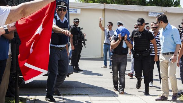A Turkish military officer is transferred to a court hall in the city of Alexandroupolis, northern Greece, Thursday, July 21, 2016 - Sputnik International