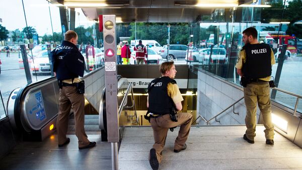 Police secures the entrance to a subway station near a shopping mall where a shooting took place on July 22, 2016 in Munich - Sputnik International