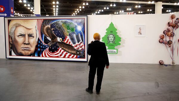 A security guard stands in front of artwork depicting Presidential candidates including Donald Trump, Hillary Clinton, and Rick Perry during the Politicon convention in Pasadena, California, U.S. June 25, 2016 - Sputnik International