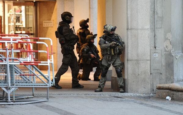 Police secures the area of a subway station Karlsplatz (Stachus) near a shopping mall following a shooting on July 22, 2016 in Munich - Sputnik International