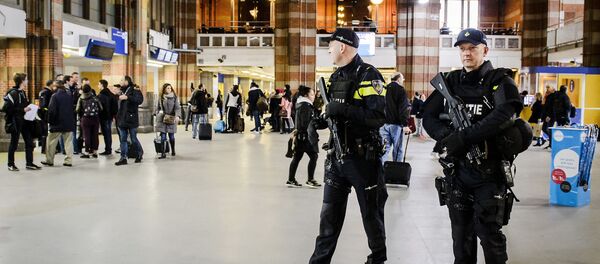 Dutch officers carry out extra patrols at the Central Station in Amsterdam, The Netherlands, 22 March 2016 Dutch officers carry out extra patrols at the Central Station in Amsterdam, The Netherlands, 22 March 2016 - Sputnik International
