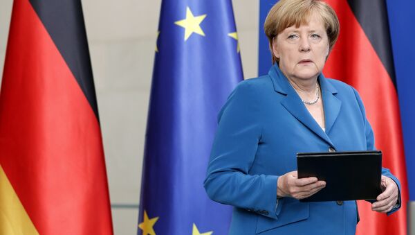 German Chancellor Angela Merkel arrives for a statement in Berlin, Germany, Saturday, July 23, 2016 on the Munich attack. - Sputnik International