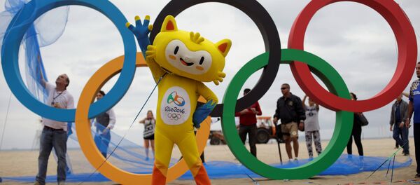 The 2016 Rio Olympics mascot Vinicius attends the inauguration ceremony of the Olympic Rings placed at the Copacabana Beach in Rio de Janeiro, Brazil, July 21, 2016. The 2016 Rio Olympics mascot Vinicius attends the inauguration ceremony of the Olympic Rings placed at the Copacabana Beach in Rio de Janeiro, Brazil, July 21, 2016. - Sputnik International