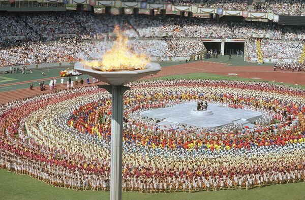 The Olympic torch towers above the Olympic stadium in Seoul Sept. 17, 1988, during the opening ceremonies for the summer Olympic Games in Seoul. (File) - Sputnik International