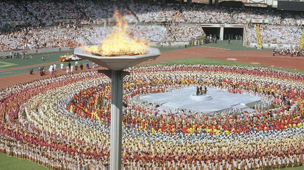 The Olympic torch towers above the Olympic stadium in Seoul Sept. 17, 1988, during the opening ceremonies for the summer Olympic Games in Seoul. (File) - Sputnik International