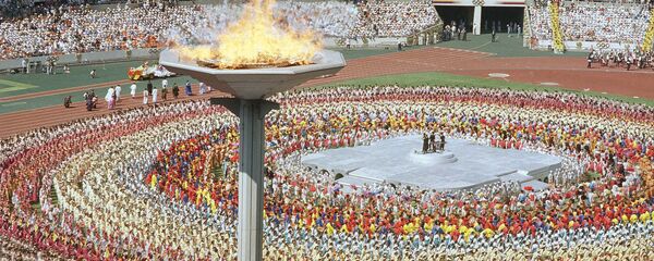The Olympic torch towers above the Olympic stadium in Seoul Sept. 17, 1988, during the opening ceremonies for the summer Olympic Games in Seoul. (File) - Sputnik International