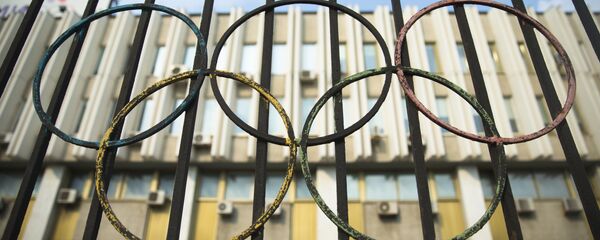 The Olympics rings are seen on a fence in front of the Russian Olympic Committee building in Moscow, Russia, Sunday, July 24, 2016. The Olympics rings are seen on a fence in front of the Russian Olympic Committee building in Moscow, Russia, Sunday, July 24, 2016. - Sputnik International