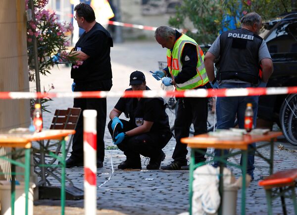Police secure the area after an explosion in Ansbach, Germany, July 25, 2016. Police secure the area after an explosion in Ansbach, Germany, July 25, 2016. - Sputnik International