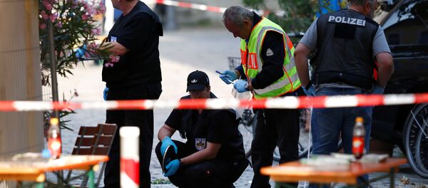 Police secure the area after an explosion in Ansbach, Germany, July 25, 2016. Police secure the area after an explosion in Ansbach, Germany, July 25, 2016. - Sputnik International