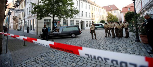 A hearse leaves the area after an explosion in Ansbach near Nuremberg, Germany, July 25, 2016. A hearse leaves the area after an explosion in Ansbach near Nuremberg, Germany, July 25, 2016. - Sputnik International