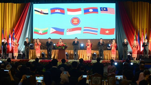 Delegates and performers sing the ASEAN anthem during the opening ceremony of the Association of Southeast Asian Nations' (ASEAN) 49th annual ministerial meeting in Vientiane on July 24, 2016. - Sputnik International