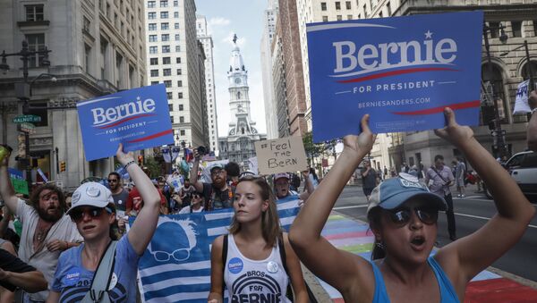 Supporters of Sen. Bernie Sanders, I-Vt., march during a protest in downtown on Sunday, July 24, 2016, in Philadelphia. The Democratic National Convention starts Monday in Philadelphia. - Sputnik International