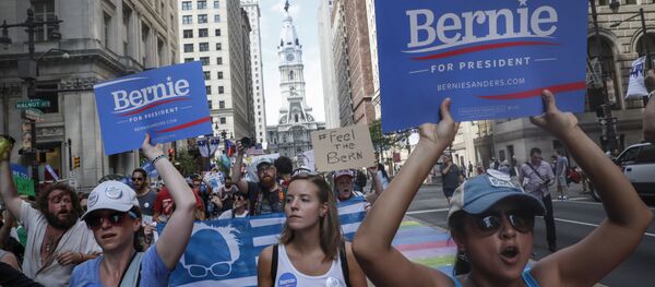 Supporters of Sen. Bernie Sanders, I-Vt., march during a protest in downtown on Sunday, July 24, 2016, in Philadelphia. The Democratic National Convention starts Monday in Philadelphia. Supporters of Sen. Bernie Sanders, I-Vt., march during a protest in downtown on Sunday, July 24, 2016, in Philadelphia. The Democratic National Convention starts Monday in Philadelphia. - Sputnik International
