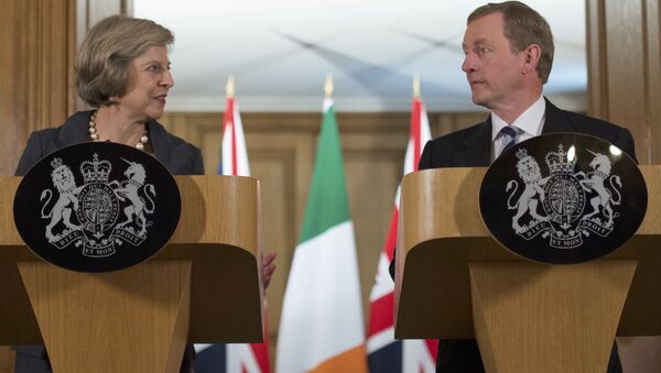 Britain's Prime Minister Theresa May (L) and Irish Taoiseach Enda Kenny hold a joint news conference inside 10 Downing Street, London - Sputnik International