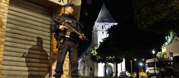 French riot police guards the street to access the church where an hostage taking left a priest dead in Saint-Etienne-du-Rouvray, Normandy, France, Tuesday, July 26, 2016 French riot police guards the street to access the church where an hostage taking left a priest dead in Saint-Etienne-du-Rouvray, Normandy, France, Tuesday, July 26, 2016 - Sputnik International