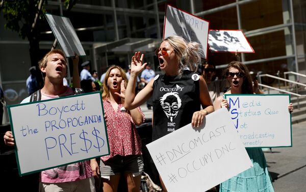 Demonstrators protest outside the Comcast Center in Philadelphia, Wednesday, July 27, 2016, during the third day of the Democratic National Convention. - Sputnik International