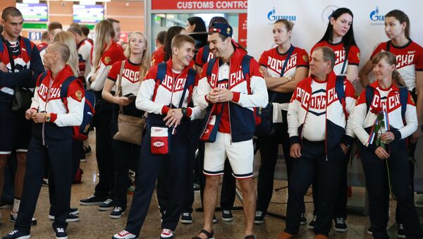 Russian Olympic team departs for Rio de Janeiro - Sputnik International